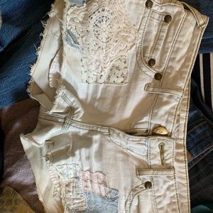 Free people 25 white denim shorts.